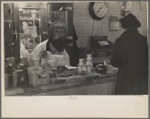 Interior of a grocery store showing the cheese and dairy counter