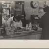 Interior of a grocery store showing the cheese and dairy counter