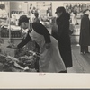 Interior of a grocery store showing the produce section