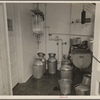 Releaser room. Combine [?] milker to fill cans before separating and bottling. Prince Georges County, Beltsville, Maryland.
