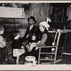 Joe Handley and family in their home at Walker County, Alabama