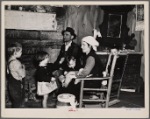 Joe Handley and family in their home at Walker County, Alabama