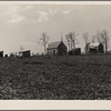 General vista of houses and field, Cumberland Homesteads. Crossville, Tennessee.