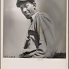 Outdoor portrait of man in cloth cap
