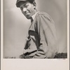 Outdoor portrait of man in cloth cap