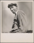 Outdoor portrait of man in cloth cap