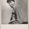 Outdoor portrait of man in cloth cap