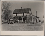 Everett Shoemaker, tenant farmer near Shadeland, Indiana, moving his household goods from the farm
