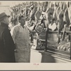 Interior of a grocery store. Dressed poultry