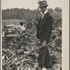 Man with ax and woodpile
