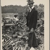 Man with ax and woodpile