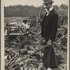 Man with ax and woodpile