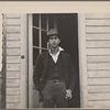 Man with cigarette in a doorway