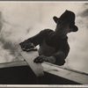 Carpenter at work on the first laborer's shelter at the Berwyn project near the lake site, [Greenbelt,] Maryland.
