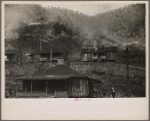 Miners' homes with slag pile burning in background, Smithers, West Virginia