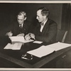 Creditor and debtor signing agreement of farm debt adjustment. Champaign, Illinois.