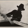 Carpenter at work on the first laborer's shelter at the Berwyn project near the lake site, [Greenbelt,] Maryland.