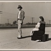 Young family, penniless, hitchhiking on U.S. Highway 99, California. The father, twenty-four, and the mother, seventeen, came from Winston-Salem, North Carolina, early in 1935. Their baby was born in the Imperial Valley, California, where they were working as field laborers