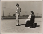 Young family, penniless, hitchhiking on U.S. Highway 99, California. The father, twenty-four, and the mother, seventeen, came from Winston-Salem, North Carolina, early in 1935. Their baby was born in the Imperial Valley, California, where they were working as field laborers