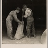 Farmers sacking grasshopper bait. Oklahoma City, Oklahoma