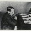 Henry Cowell playing the piano