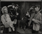Unidentified actors, Avis Bunnage, and Maxwell Shaw in the stage production The Hostage