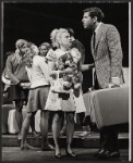 Tony Roberts [at right] and unidentified others in the stage production How Now Dow Jones