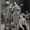 Robert Morse [right] and ensemble in the stage production How to Succeed in Business Without Really Trying