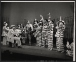 Elliott Gould [left] Keith Michell [center] and ensemble in the stage production Irma La Douce