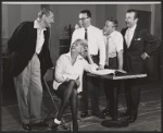 Sam Levene [left], Barbara Nichols [seated], Stanley Prager [center with glasses], George Gobel [center right leaning on table] and unidentified others in rehearsal for the stage production Let It Ride!