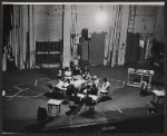 The cast and production team in rehearsal for the stage production The Loud Red Patrick