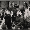 Dennis King [center] and unidentified others in the stage production Love and Libel