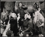 Dennis King [center] and unidentified others in the stage production Love and Libel