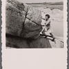 Jean Garrigue pushing huge boulder up hill