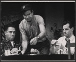 Walter Matthau (center) and unidentified cast members in the stage production The Odd Couple.