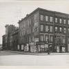 Boarded residential building on the corner of Madison Avenue and East 133rd Street, Harlem, New York City, 1938