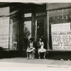 Sidewalk sitters. Two women sitting in doorway of empty storefront that is being offered for rent, Harlem, New York City, ca. 1930s