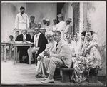 James Coco [at table] Eric Portman [front] and ensemble in the stage production A Passage to India
