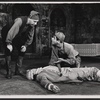 Donald Pleasence [on floor] and unidentified others in the stage production Poor Bitos