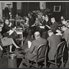 Lyn Austin [seated far left], Joseph Anthony [seated third from left], Robert Duvall [background center wearing tie], Suzanne Osborne [next to Duvall], Howard Da Silva [next to Osborne], Cyril Ritchard [next to Da Silva], Graham Jarvis [second from far right with glasses], Fred Stewart [far right] and unidentified others in rehearsal for the 1962 stage production of Romulus