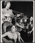 Dave Ringland [background left with guitar], Nick Rawson [foreground with guitar], Elizabeth Herring [right with trumpet] and unidentified [with flute] in the 1969 stage production Stomp