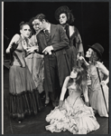 Ellen Greene [far left], Raul Julia, Gretel Cummings [in bonnet] and ensemble in the 1976 Broadway production of The Threepenny Opera