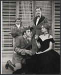 Ted van Griethuysen [kneeling foreground], Hiram Sherman [standing center], Carrie Nye [seated foreground right] and unidentified [standing left in background] in the 1961 American Shakespeare Festival production of Troilus and Cressida