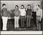 Josh Mostel [center] and unidentified others in the stage production Unlikely Heroes