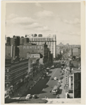 View of West 125th Street, looking west towards Seventh Avenue, with the Hotel Theresa at center behind Kanter's Department Store, ca. 1940s