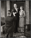 Unidentified actor, Melvyn Douglas, and Leora Dana in the stage production The Best Man