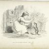 Young girl playing with a dog.