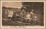 Shanghai.  Country women on wheel barrow.