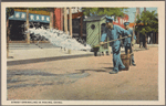 Street sprinkling in Peking, China.