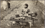 Young woman selling foodstuff.